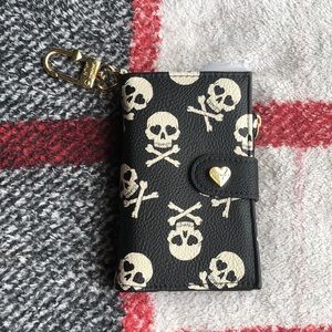 Brand new Betsey Johnson wallet. Never been used.